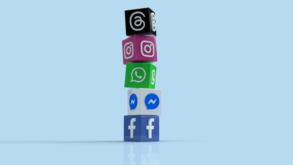 10 Social Media Marketing Tips for Small Businesses 1 a stack of colorful blocks with social icons on them